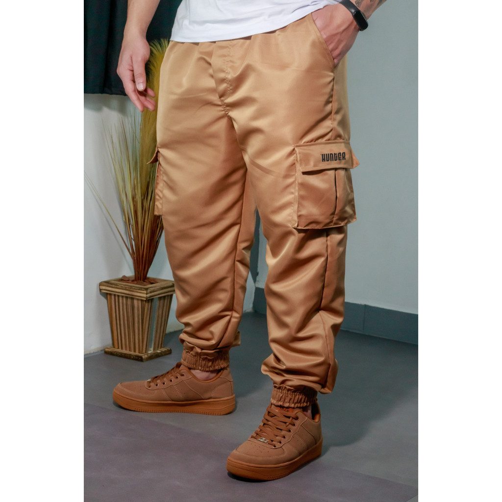 Calça Cargo Corta Vento Jogger Unisex Bege: Estilo e Proteção para o Dia a Dia