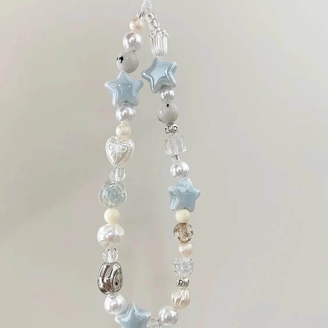Cordão de Celular Pérola: Charme e Estilo!