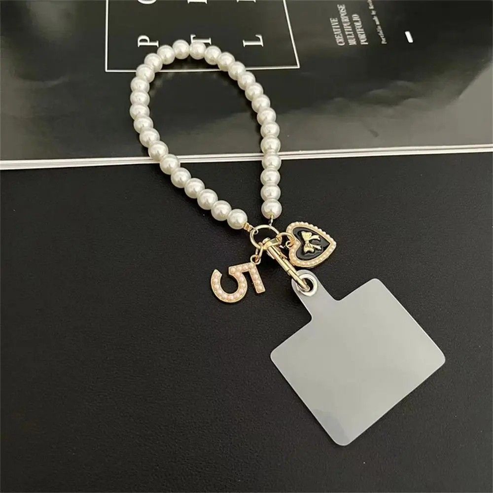 Cordão de Pérolas para Celular: Estilo e Segurança no Pulso