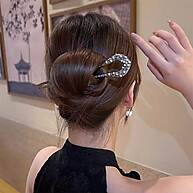 Presilha Borboleta Strass: Elegância Retro para Seu Cabelo ✨ - imagem 1