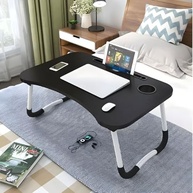 cama-para-dobravel-conforto-sofa-ou-total-premium-a-notebook-na-mesa-a