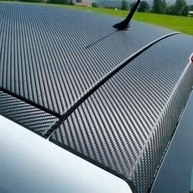 Envelopamento Fibra de Carbono Preto 3D: Transforme Seu Veículo com Estilo e Proteção - imagem 4