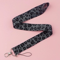 Chaveiros Estampados Onça: Elegância e Praticidade - imagem 1