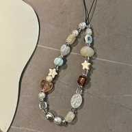 Cordão de Celular Estrela: Elegância e Segurança - imagem 1