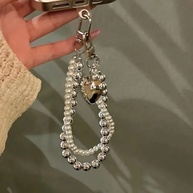 Cordão de Celular Pérola: Estilo e Segurança! - imagem 4
