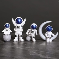 Conjunto de 4 Estátuas de Astronauta Azul e Branco - Decoração Espacial para Quarto, Berçário e Topo de Bolo - imagem 1
