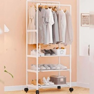 organize-dupla-a-com-com-praticidade-roupas-arara-prateleiras-e-estilo-de-a