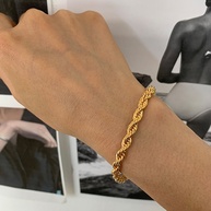 Pulseira de Aço Inox Torcida: Estilo e Elegância - imagem 1