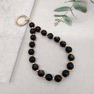 Pulseira Olho de Gato: Estilo Retrô e Versátil - imagem 4