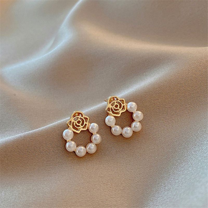 Brincos de Pérola Rosa: Elegância Minimalista para Mulheres