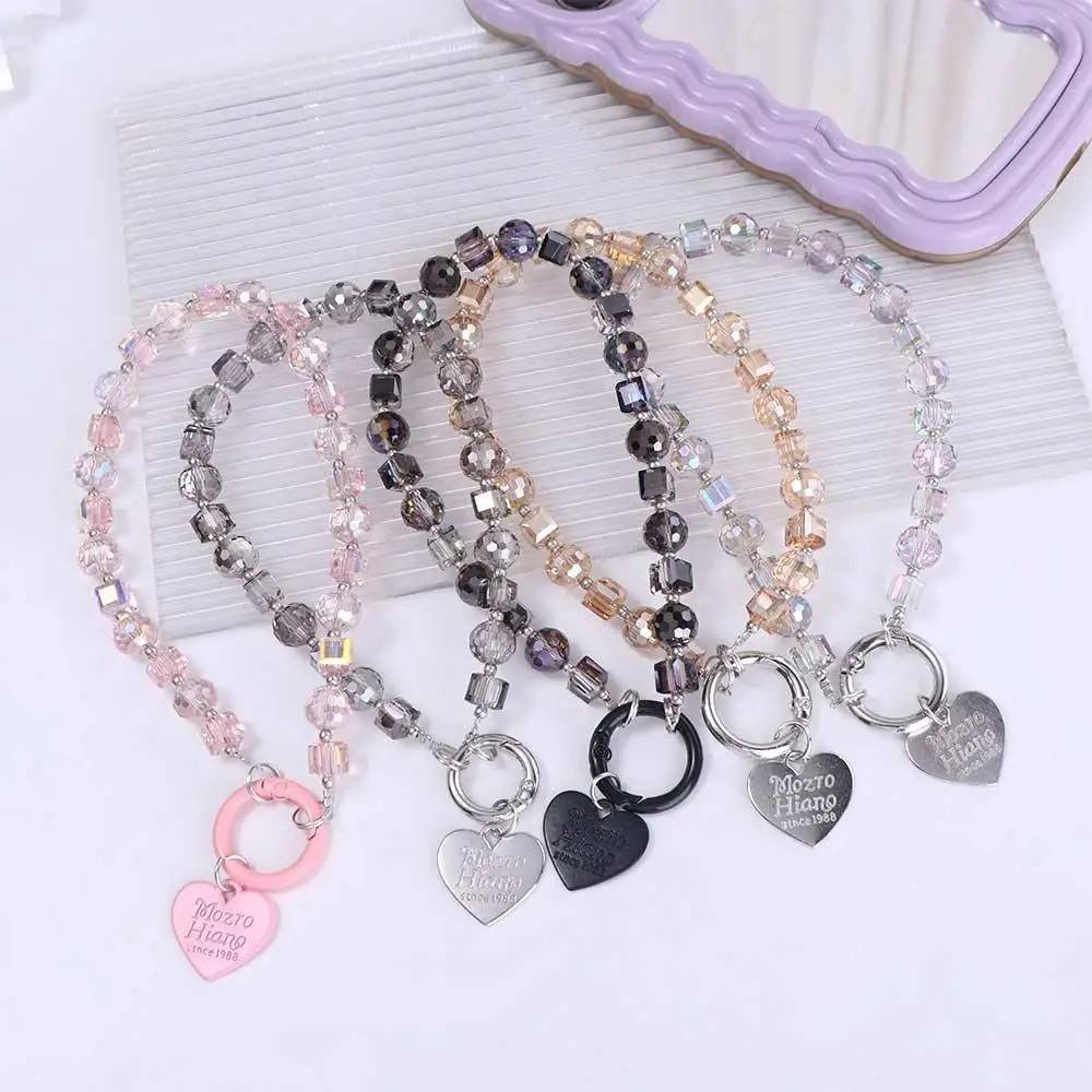 Phone Chain de Cristal com Clipe: Estilo e Segurança no Celular
