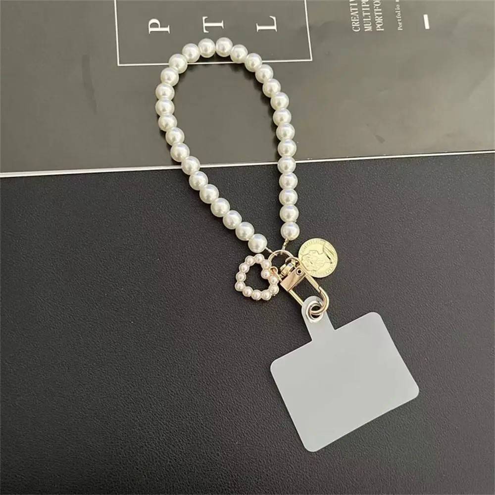 Phone Strap de Pérolas: O Salva Celular Elegante e Seguro