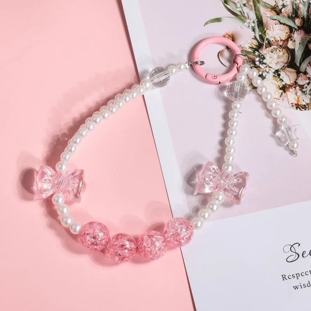 Pulseira Charmosa para Celular: Flores e Laço!