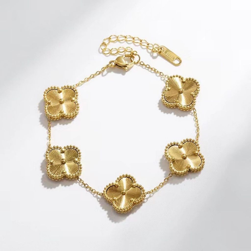 Pulseira de Madrepérola Dupla Face com Trevo de Quatro Folhas em Aço 18k – Elegância e Proteção
