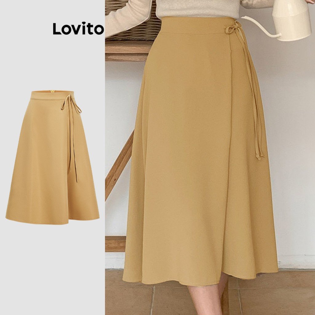 Saia Plissada Lovito: Elegância e Conforto